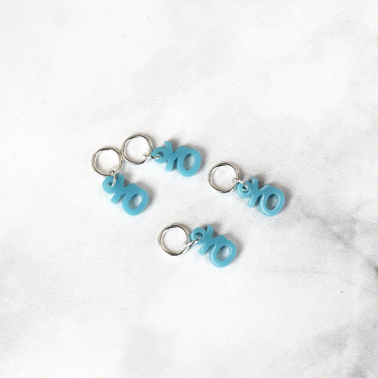 Set of 4 Laser Engraved Stitch Markers - YO - Aqua
