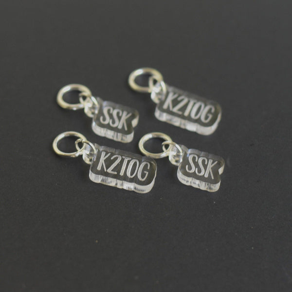 Set of 4 Laser Engraved Stitch Markers - SSK and K2TOG - Clear Outline