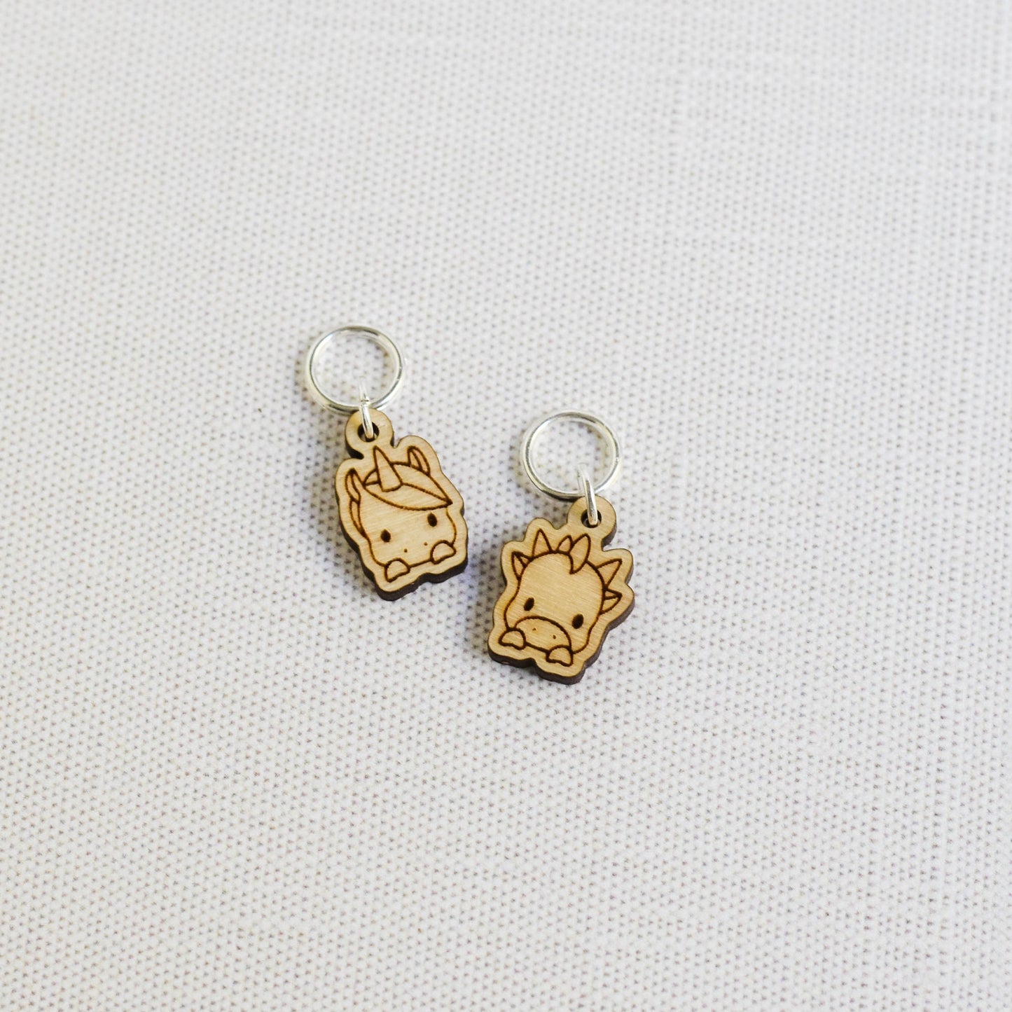 Set of 2 Laser Engraved Stitch Markers - Baby Unicorn and Dragon
